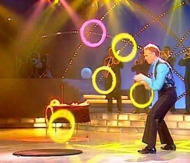 George Solveno juggles five Jumpy Rings on television