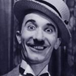 Nat Jackley wearing hat and smiling