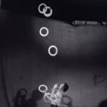 juggler throws and catches nine juggling rings