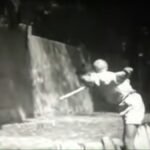 juggler with mouth stick and soccer ball neck catch