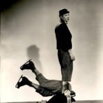comedy duo perform acrobatic routine