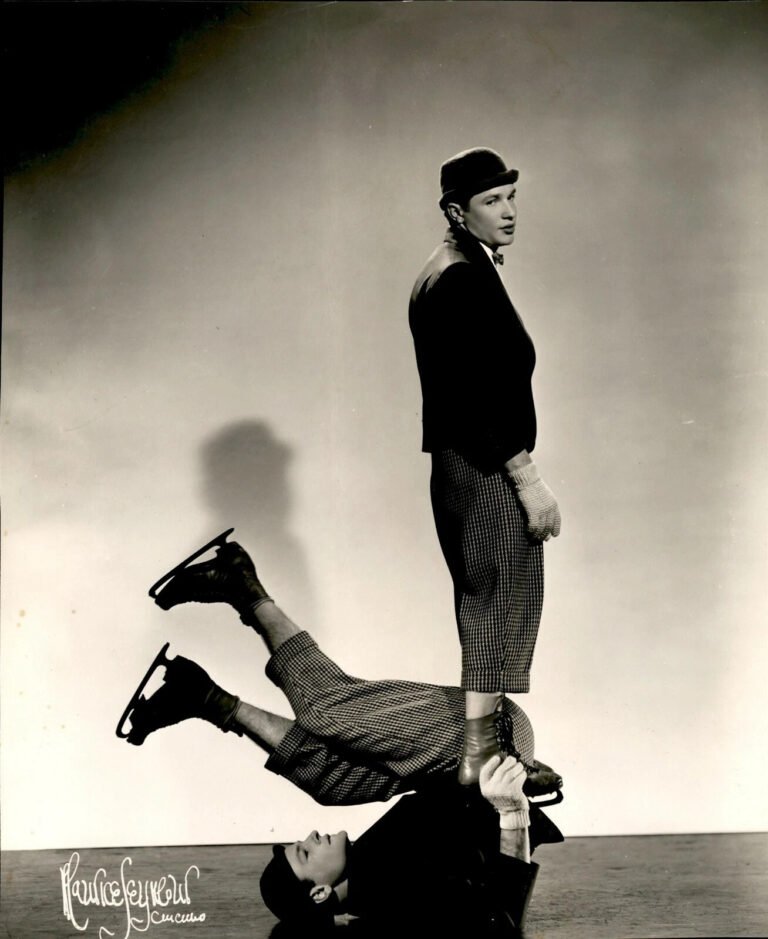 comedy duo perform acrobatic routine