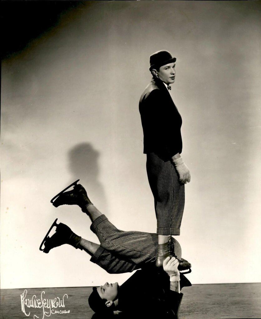 comedy duo perform acrobatic routine
